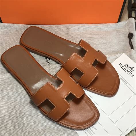 brown hermes slides|black hermes sliders.